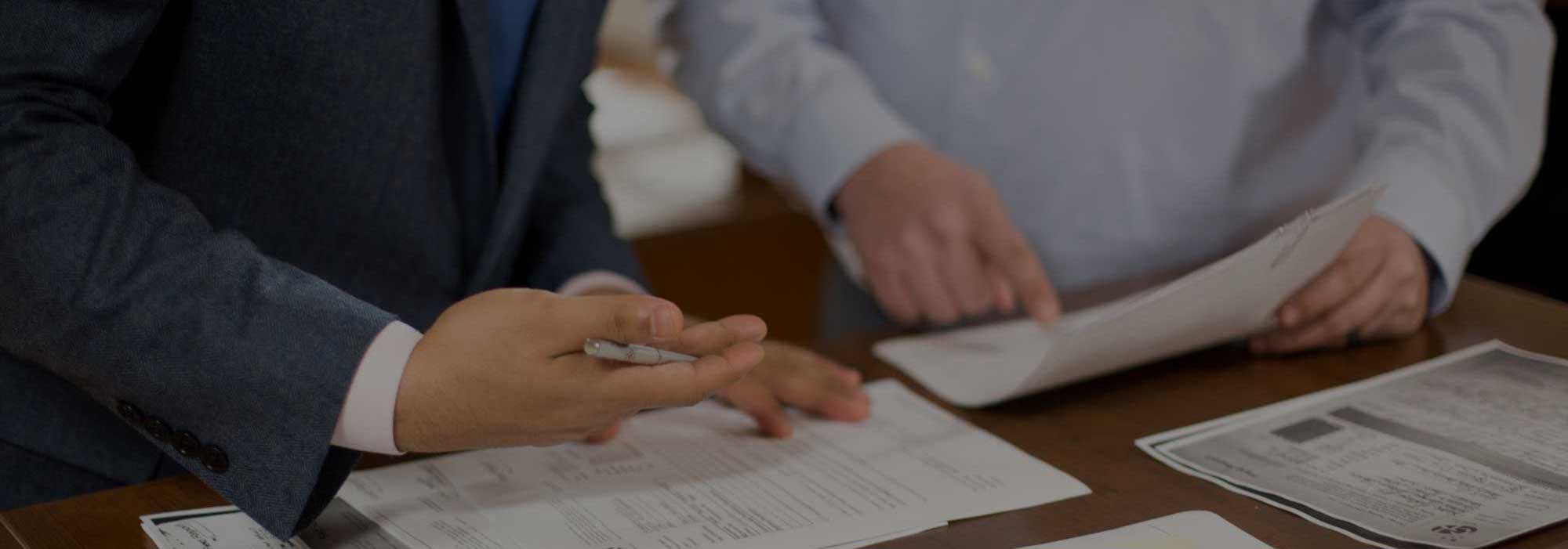 Two people going over documents