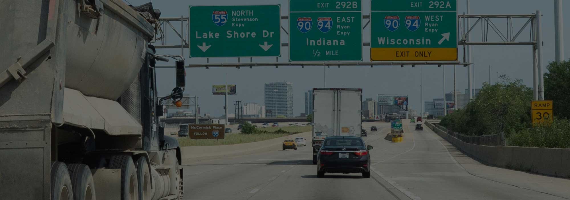 Chicago highway with trucks on it.